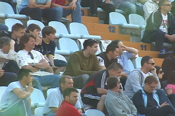 RIJEKA, CROATIA - APRIL 11: soccer supporters siting on chairs in the match between HNK "Rijeka" and HNK "Varteks", 2009 in Rijeka, Croatia. 