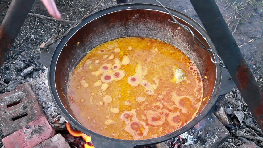 Cooking pilaf. Boils