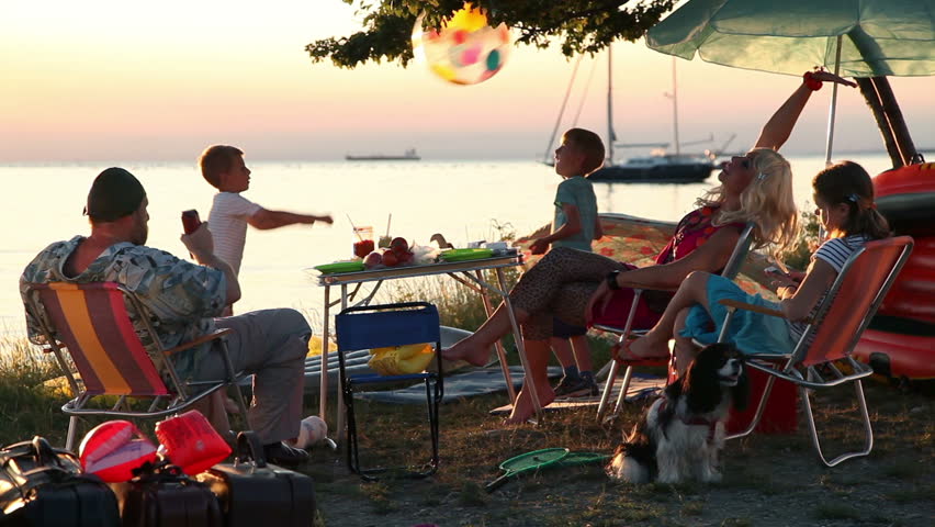 Family spending quality time ogether on the beach