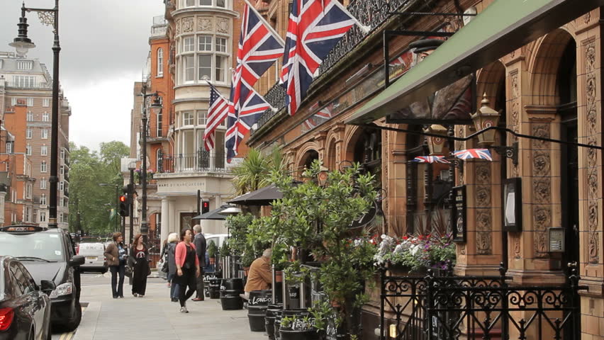 LONDON - CIRCA 2012 - Multiple Union Jacks on the wall of a building. The Union Jack is the legendary flag of the United Kingdom.