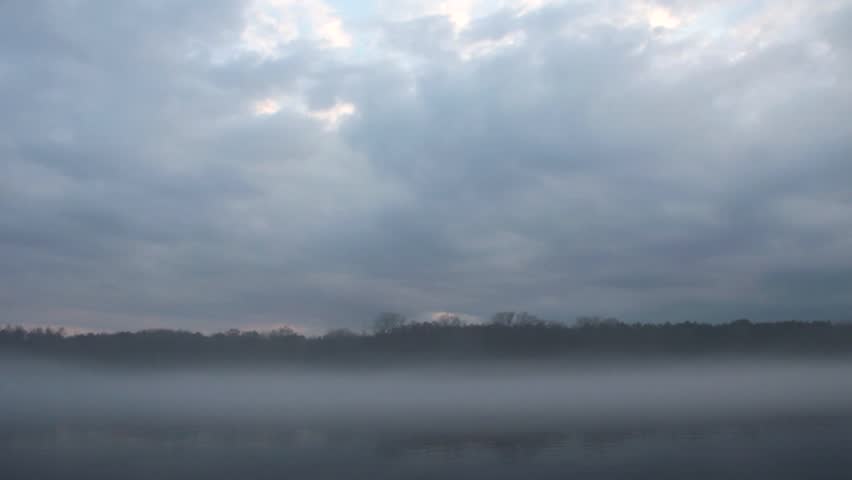 dramatic sky over foggy river (FULL HD)