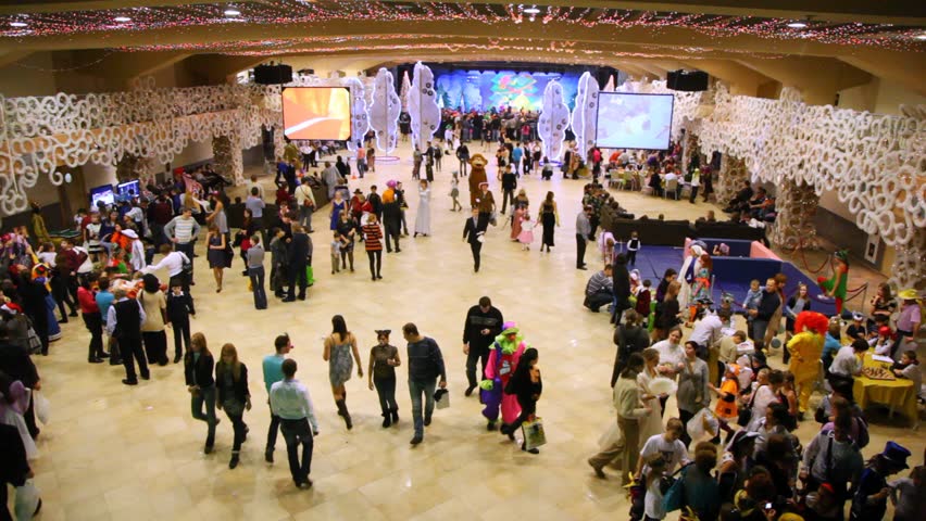 MOSCOW - JAN 04: People moving in Forum hall at New Years masquerade of Moscow families, on Jan 04, 2012 in Moscow, Russia.