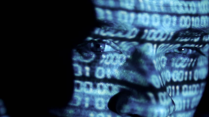 ID theft looking at the camera with binary codes reflections and animations
