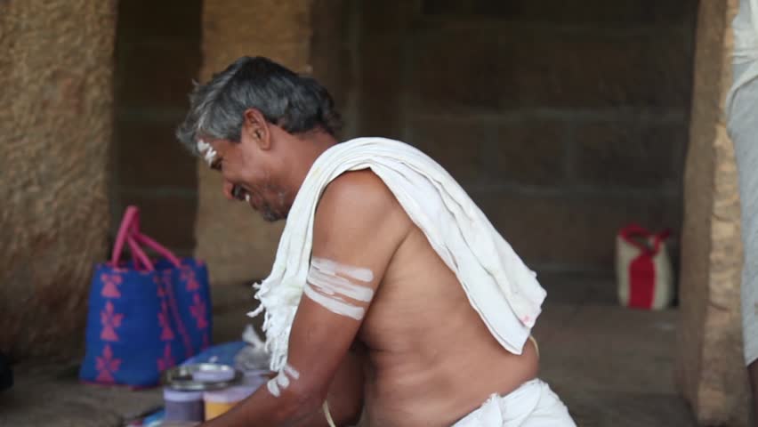 India, Hampi - 31 December 2012: Men participate in mysterious rite in Hampi