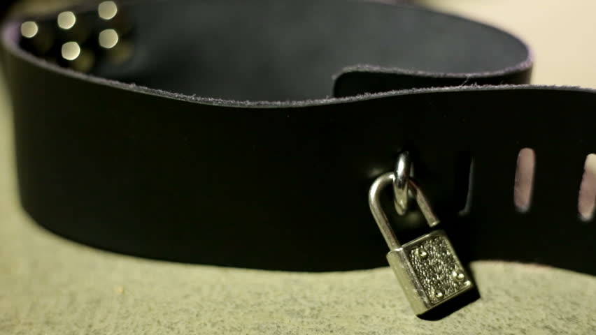 BDSM or dominance and submission for short bondage cuffs and neck collar for restricting persons freedom, doing with it whatever the dominant partner wants. Quality leather cuffs with locks.