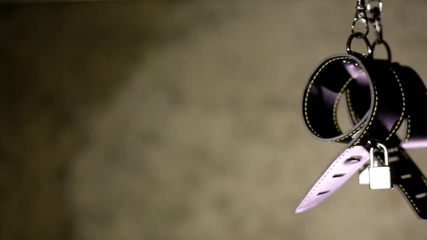 BDSM or dominance and submission for short bondage cuffs for restricting persons freedom, doing with it whatever the dominant partner wants. Quality leather cuffs with locks.