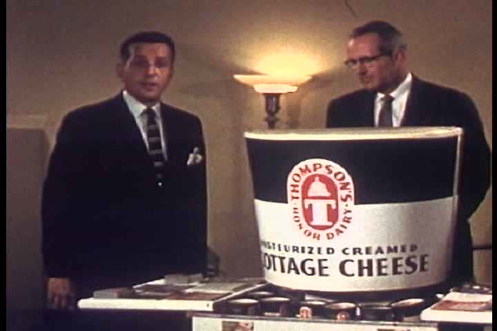 1950s - Businessmen pose in front of a huge vat of cottage cheese in this corny film about the 1950s dairy industry.