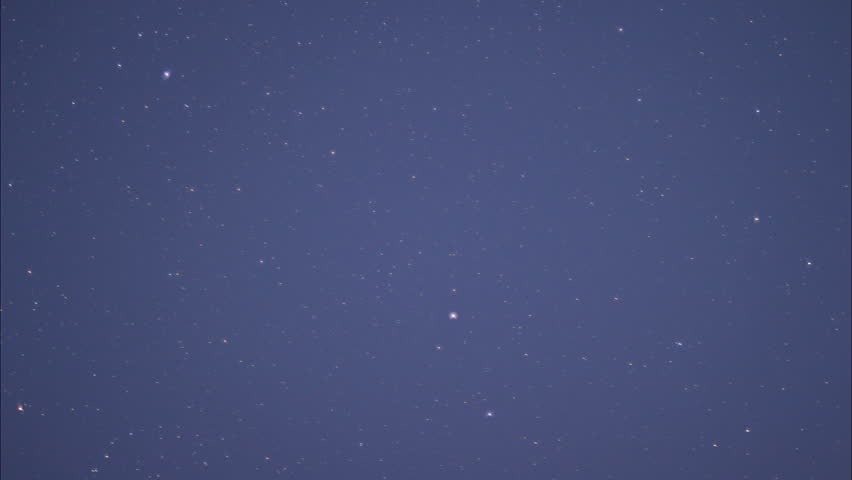 Time lapse, stars go round on the night sky.