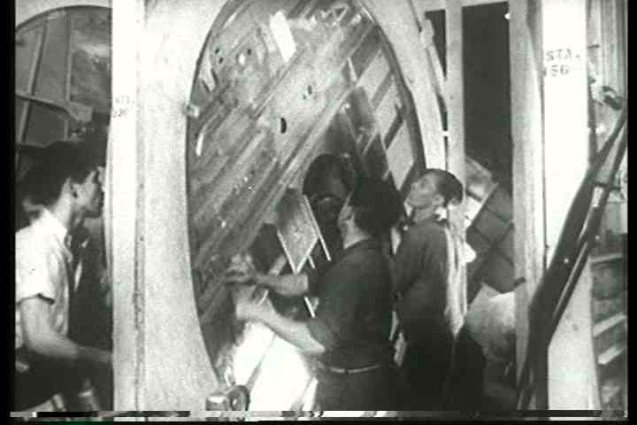 1940s - The famous Army Air Corps song accompanies shots of planes being built and flown.