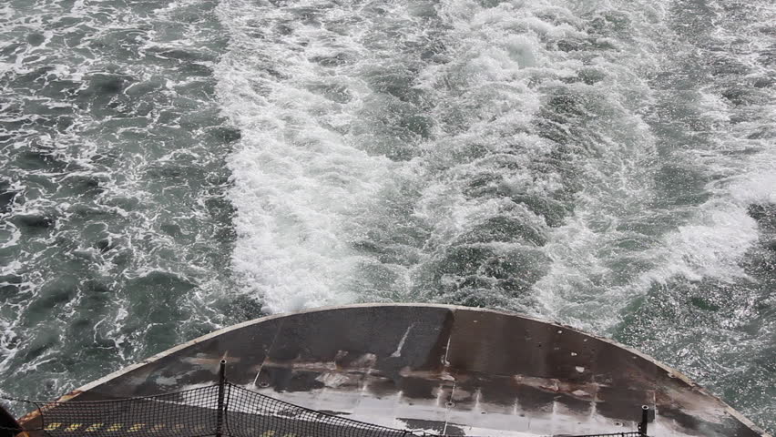 Ferry generating water waves