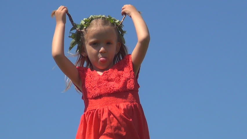 Child with Wreath Making Faces on Blue Screen, Little Girl Playing, Children