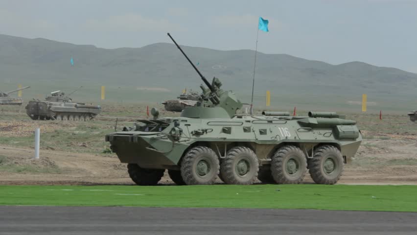 OTAR, KAZAKHSTAN - MAY 7 2013: Armored troop-carrier are moving in a predetermined direction
Kazakhstan. Otar city. Military Parade May 7, 2013
