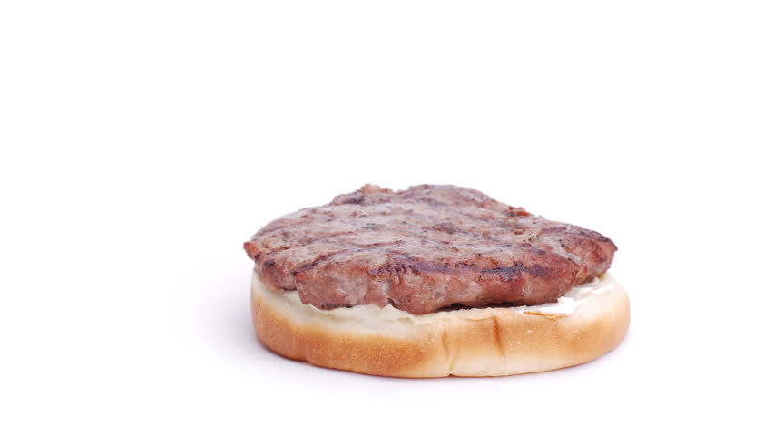 Creation of a bacon cheeseburger and then it gets eaten