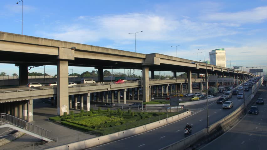 Traffic in the city. There are several freeway lane.