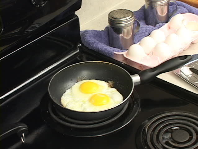 Egg being flipped over easy