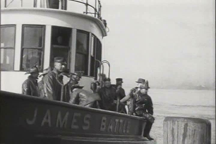 1910s, 1920s - Firefighters at a boatyard