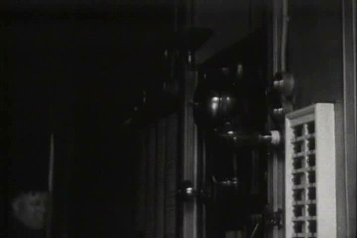 1910s, 1920s - A fire alarm sounds and firemen get ready