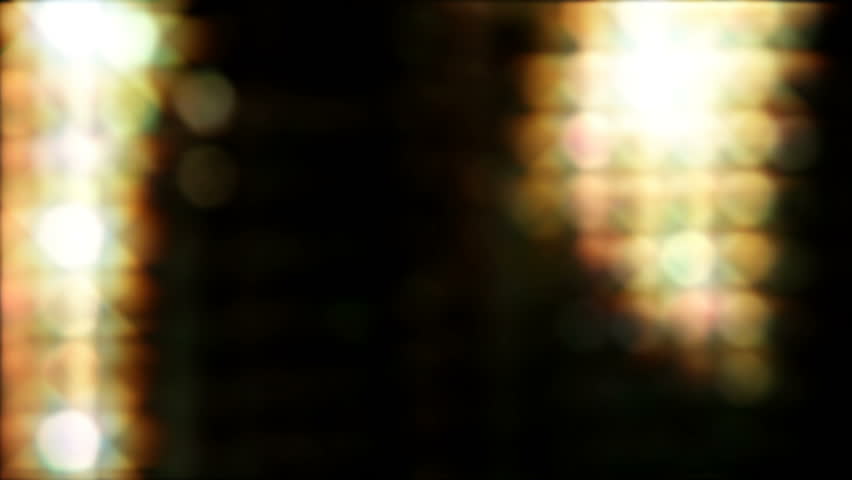 Looping shining light reflection background. Spots shining from right to left.