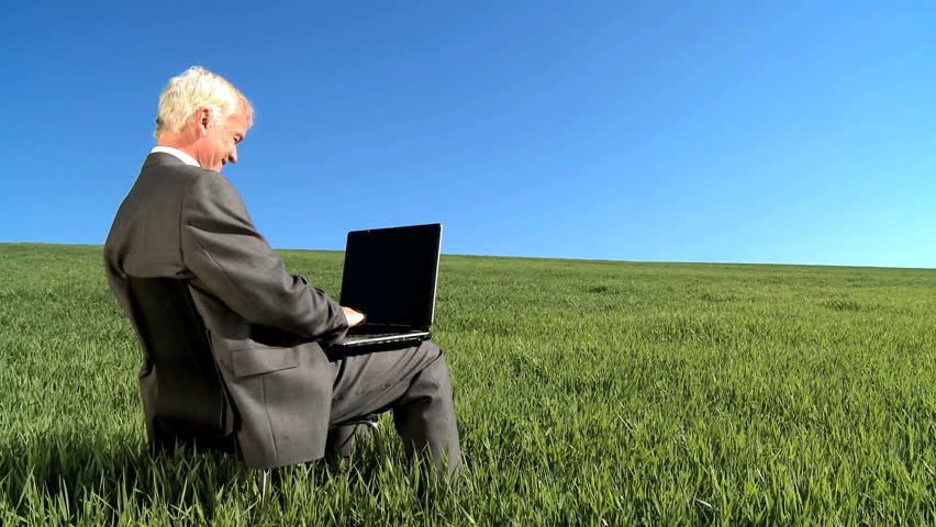 Businessman celebrating his achievements  in concept environmental office