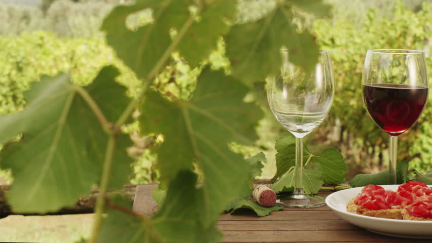 Filling Glasses with Wine in Vineyard. v5. Close-Up. Shot on RED Digital Cinema Camera in 4K (ultra-high definition (UHD)), so you can easily crop, rotate and zoom, without losing quality 