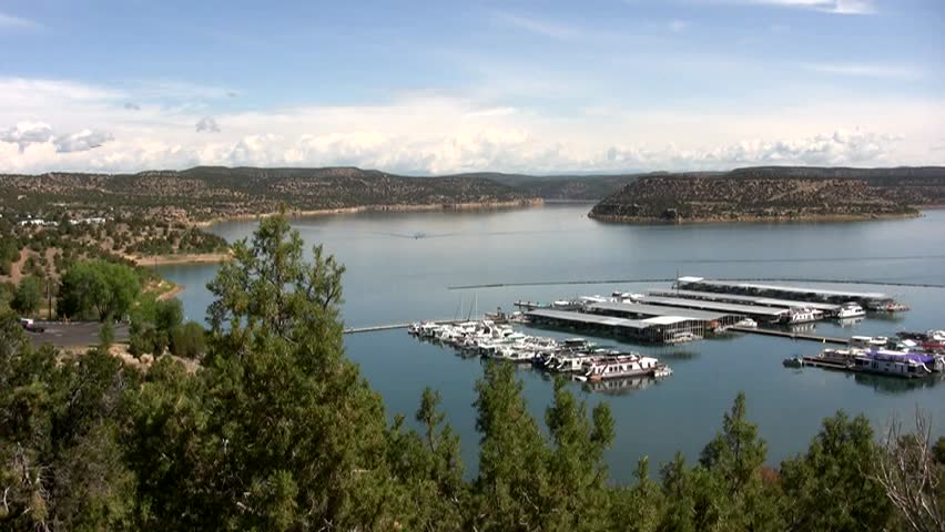 HD zoom in on a boat moving towards the marina on Navajo Lake in northern New Mexico