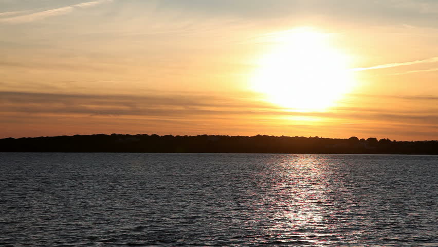 Beautiful 1080 high definition sunset over water