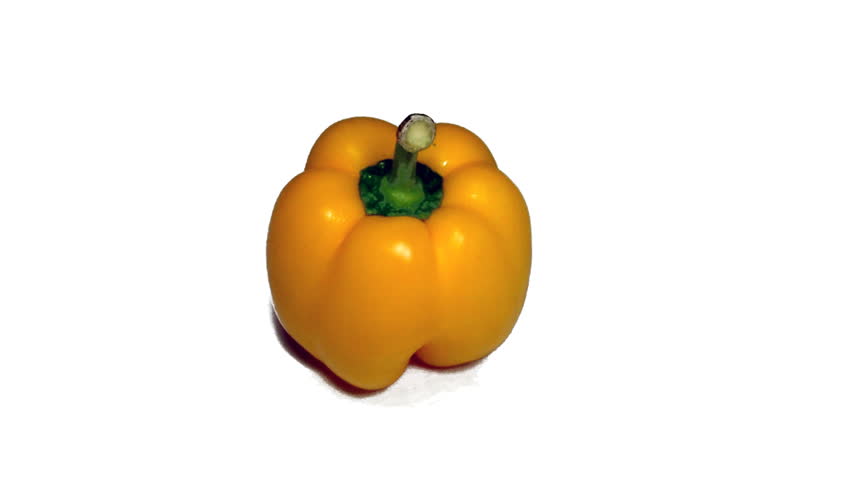 real 3D rotating yellow pepper isolated on white