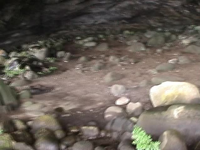 Walking into a cave Isle of Arran Scotland