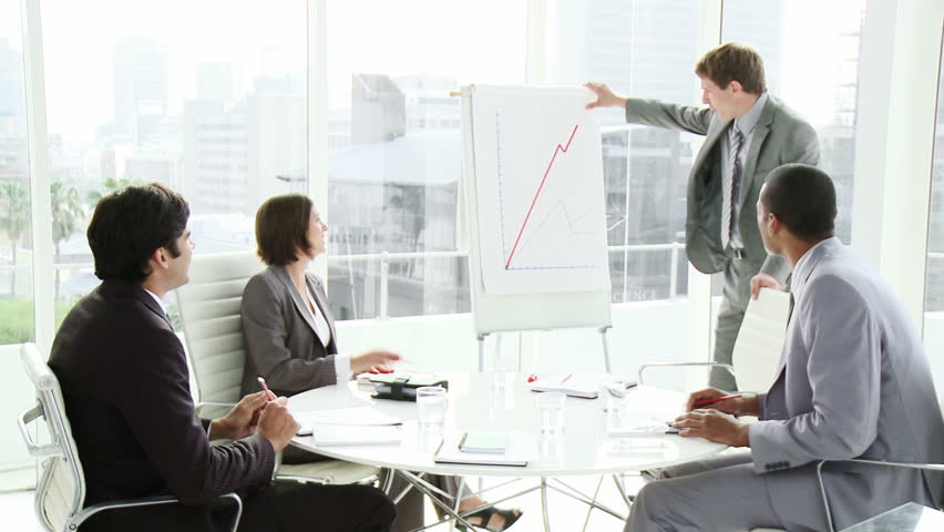 Business people in a meeting in an office in high definition. Great for showing teamwork concepts 