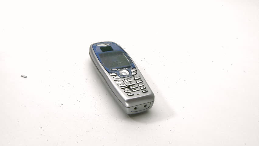 Phone stress destroying telephone with a hammer