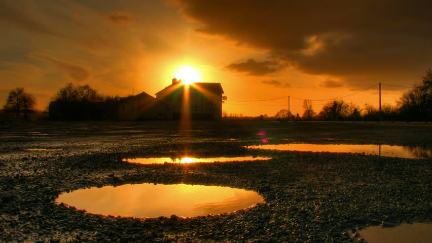 Sunset over house and water ponds, HD time lapse clip, high dynamic range imaging