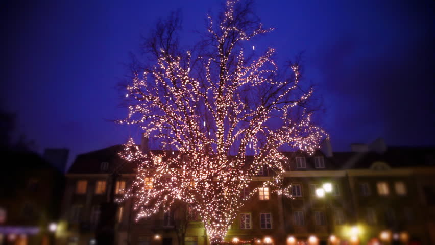 Christmas tree with lights on Warsaw