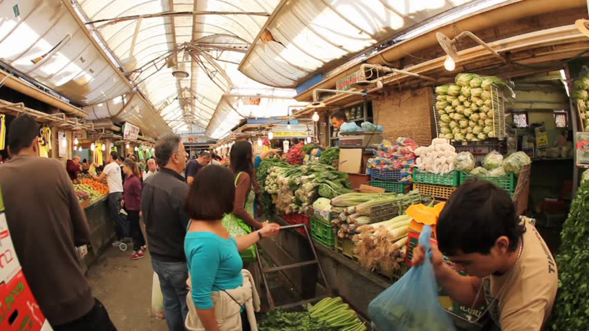 JERUSALEM, ISRAEL Ã¢â¬â DEC 31: Thousands of Israelites flock to the Mahane Yehuda market to buy fruits, vegetables, pastry, fish, meat, spices and Judaica December 31, 2009 in Jerusalem, Israel.