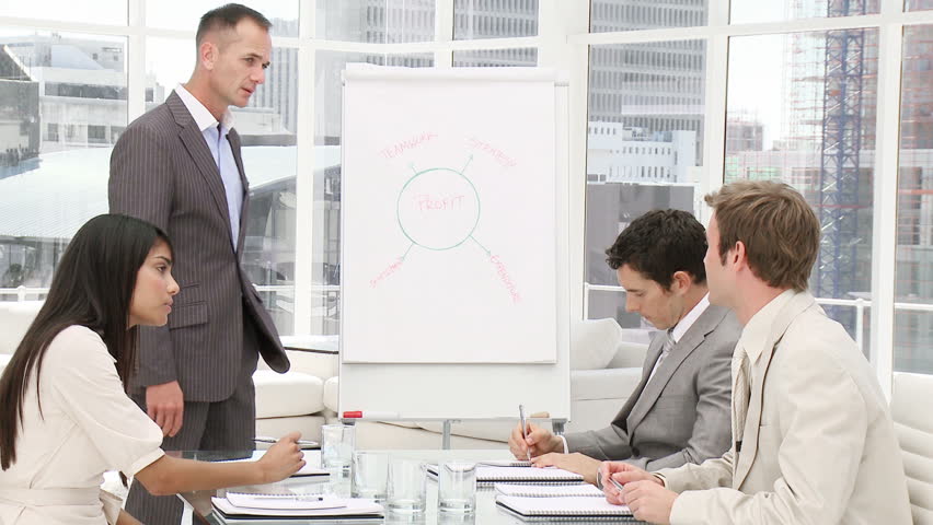 Charismatic businessman doing a presentation in the office