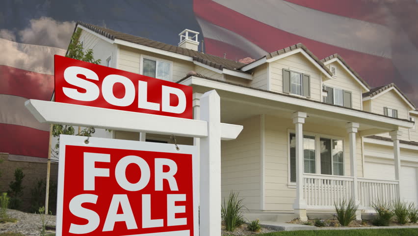 Waving Flag, Time-lapse Clouds and Sold Home for Sale Sign with House.
