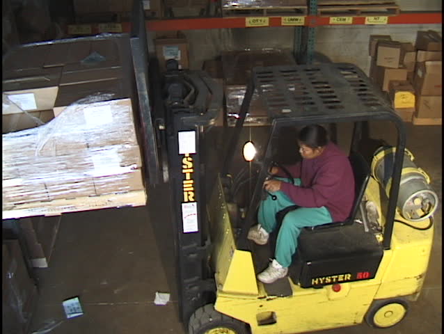 Forklift Operator Placing Skid 3
