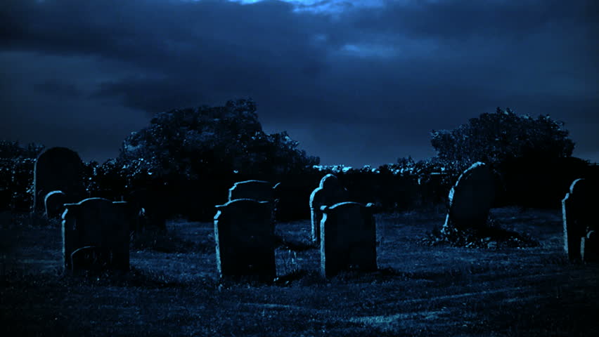 Scary graveyard with ghost mist