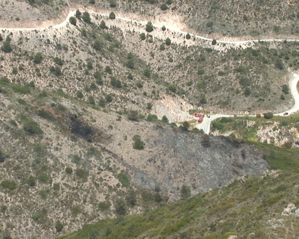 PAL: Fire department chopper dumps water on brush fire