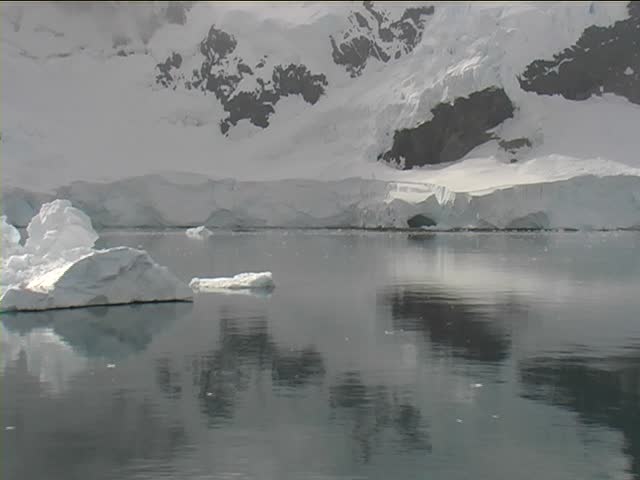 Beautiful iceberg at Antarctica on a clear sunny day. Taken from a passenger cruise ship at lemaire channel (or kodak gap).