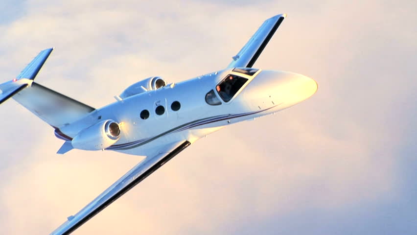 Air to air luxury corporate jet being used for modern business travel