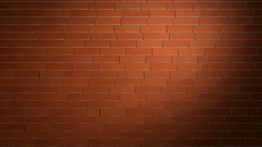 Crashing red brick wall revealing green background behind