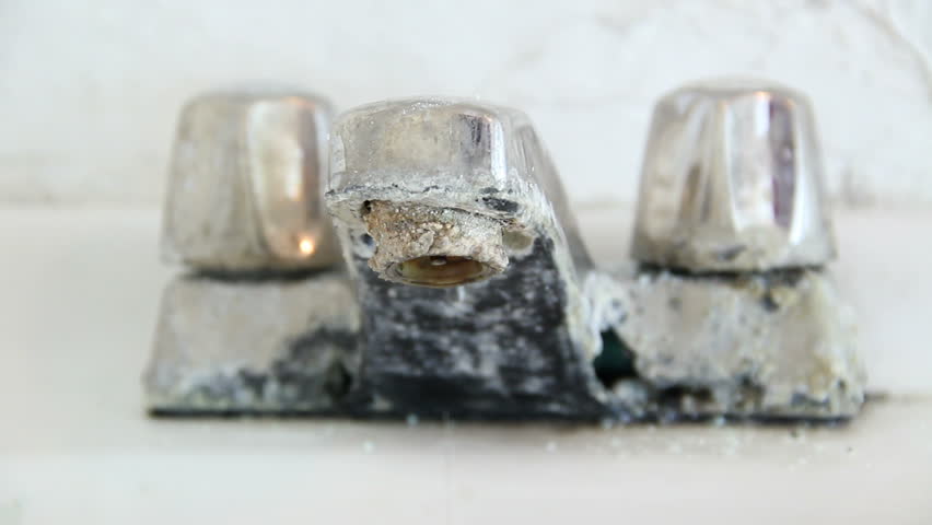 HD Stock video of closeup of leaky old faucet