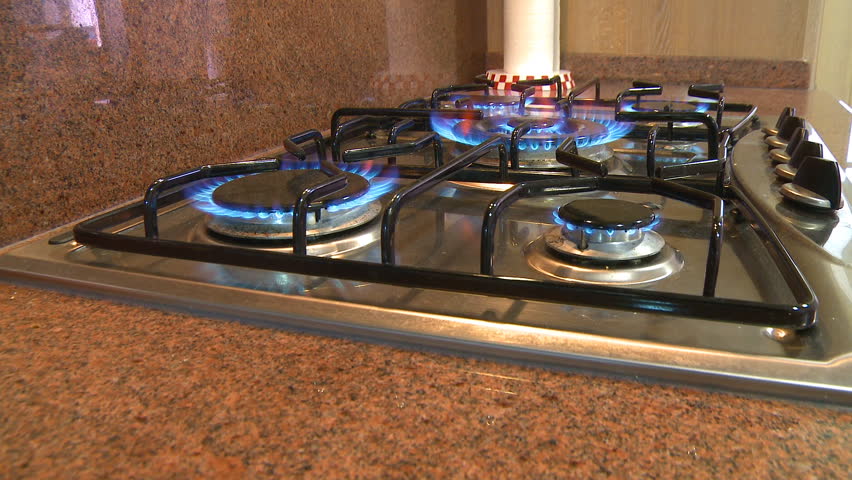 Gas stove burners flames dolly shot