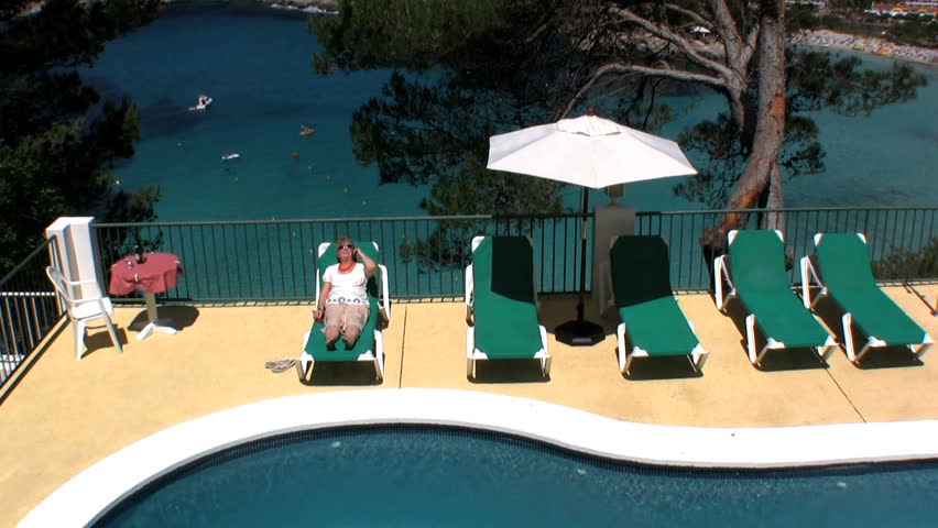 Senior relaxing at a Villa in the sun