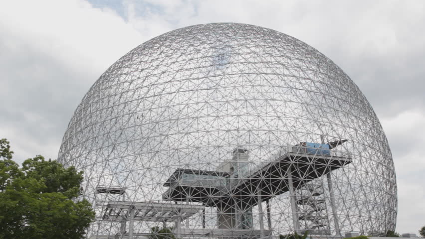Geodesic dome. Designed by Richard Buckminster Fuller, the "Biosphere" was built for Expo 67 in Montreal, Quebec, Canada. Breeze in the trees and spinning windmill inside the dome. 