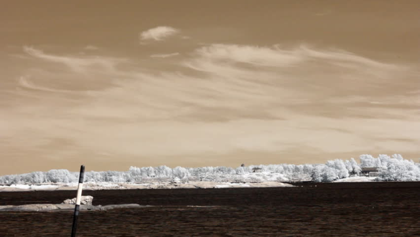 Infrared Finland: motorboat passing by in a bay 3 