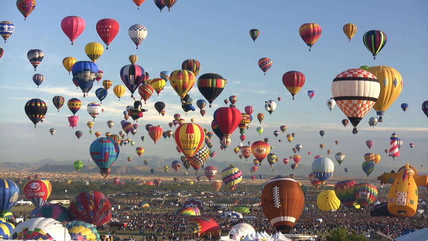 The Balloon Park field with crowd visible and many balloons filling the sky. Taken at the 2007 Albuquerque International Balloon Fiesta in New Mexico, USA. For Editorial use only.