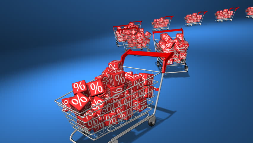 Shopping carts with red cubes. Concept of discount