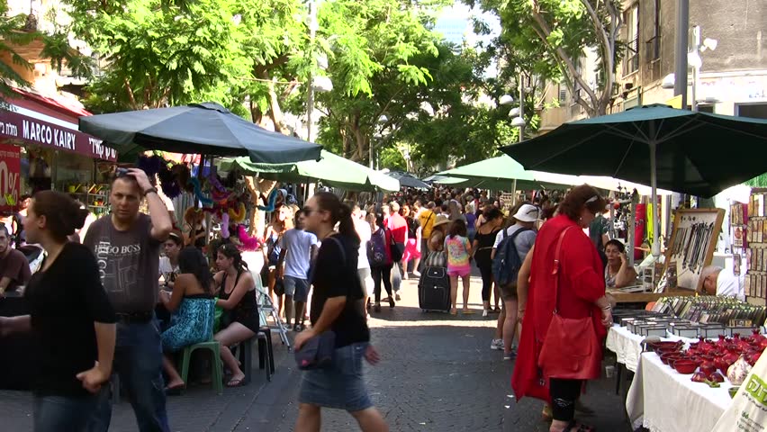 TEL AVIV, ISRAEL - JULY 06: The municipality offers street fairs where residents can buy toys and souvenirs and meet other people, Tel Aviv, Israel, July 06, 2010