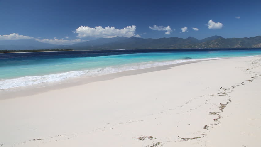 Summertime tropical island white sand beach. Gili Meno island, Lombok, Indonesia
